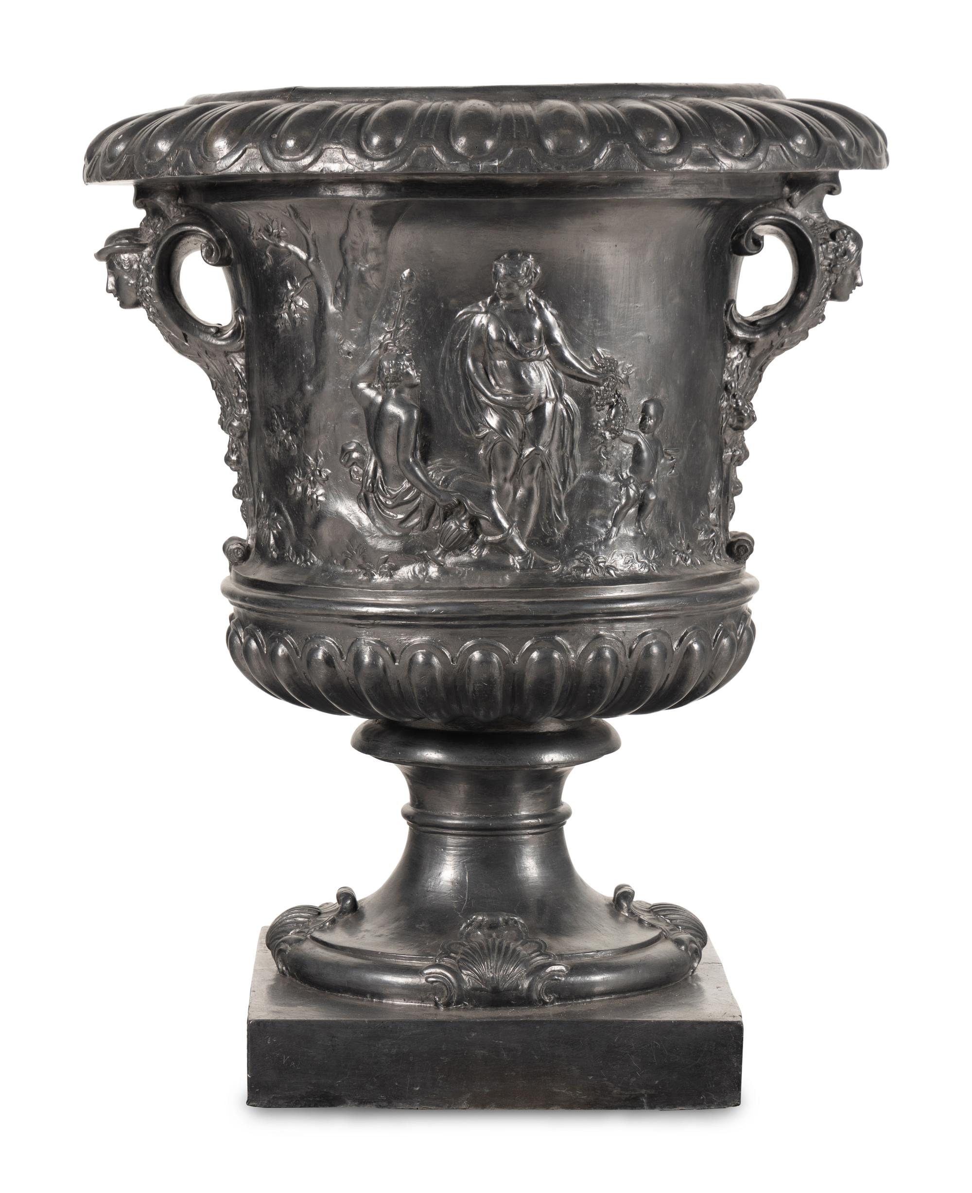 A Pair of English Lead Allegorical Garden Urns