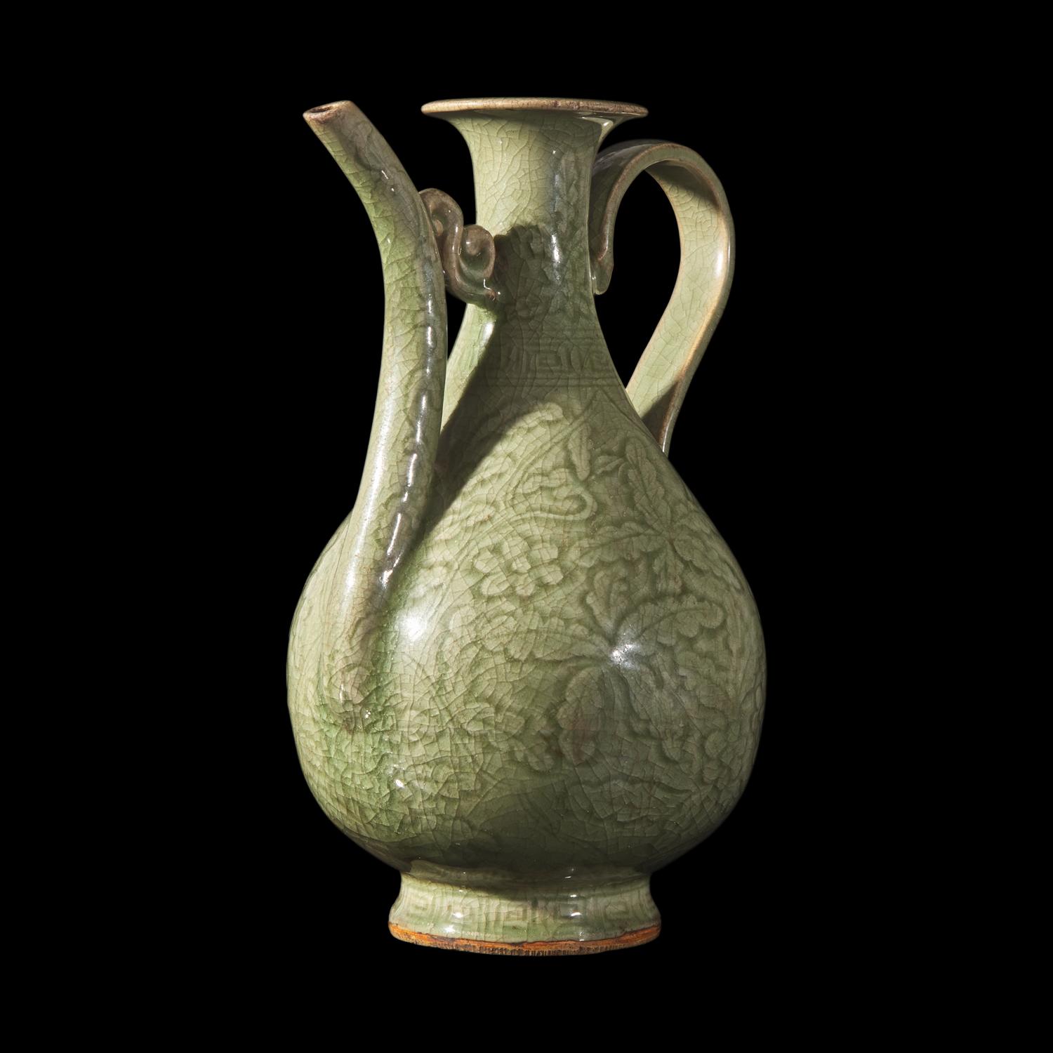 A Chinese Celadon-Glazed Porcelain Ewer, Possibly Ming Dynasty 或為明 青釉刻花執壺