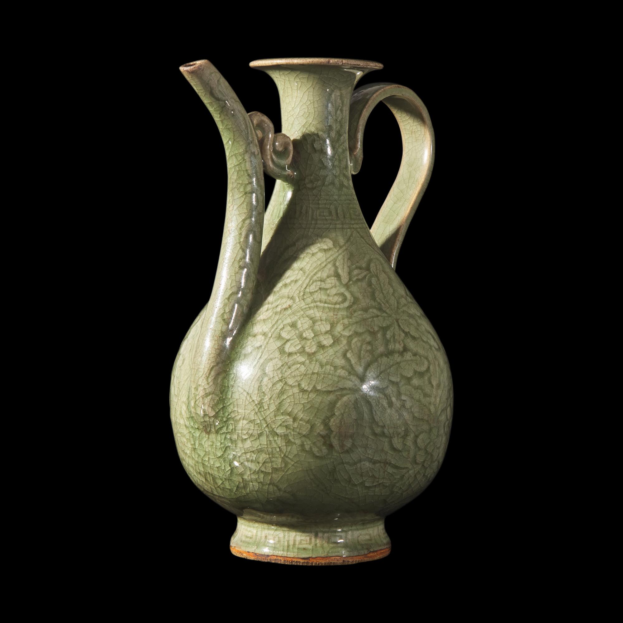 A Chinese Celadon-Glazed Porcelain Ewer, Possibly Ming Dynasty 或為明 青釉刻花執壺