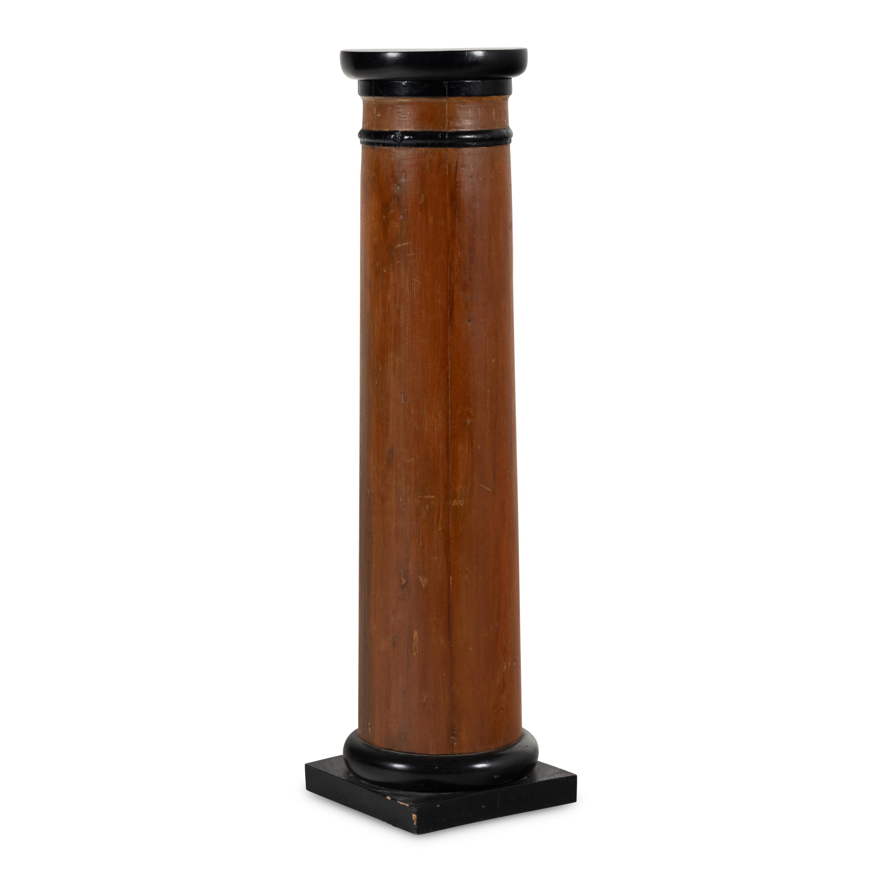 A Biedermeier Parcel-Ebonized Pine Pedestal