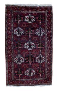 A Kerman Wool Rug 9 feet x 5 feet 6 inches.