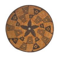 An Apache Basket Tray Height 2 3/4 x diameter 16 3/4 inches.