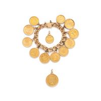 YELLOW GOLD AND COIN CHARM BRACELET