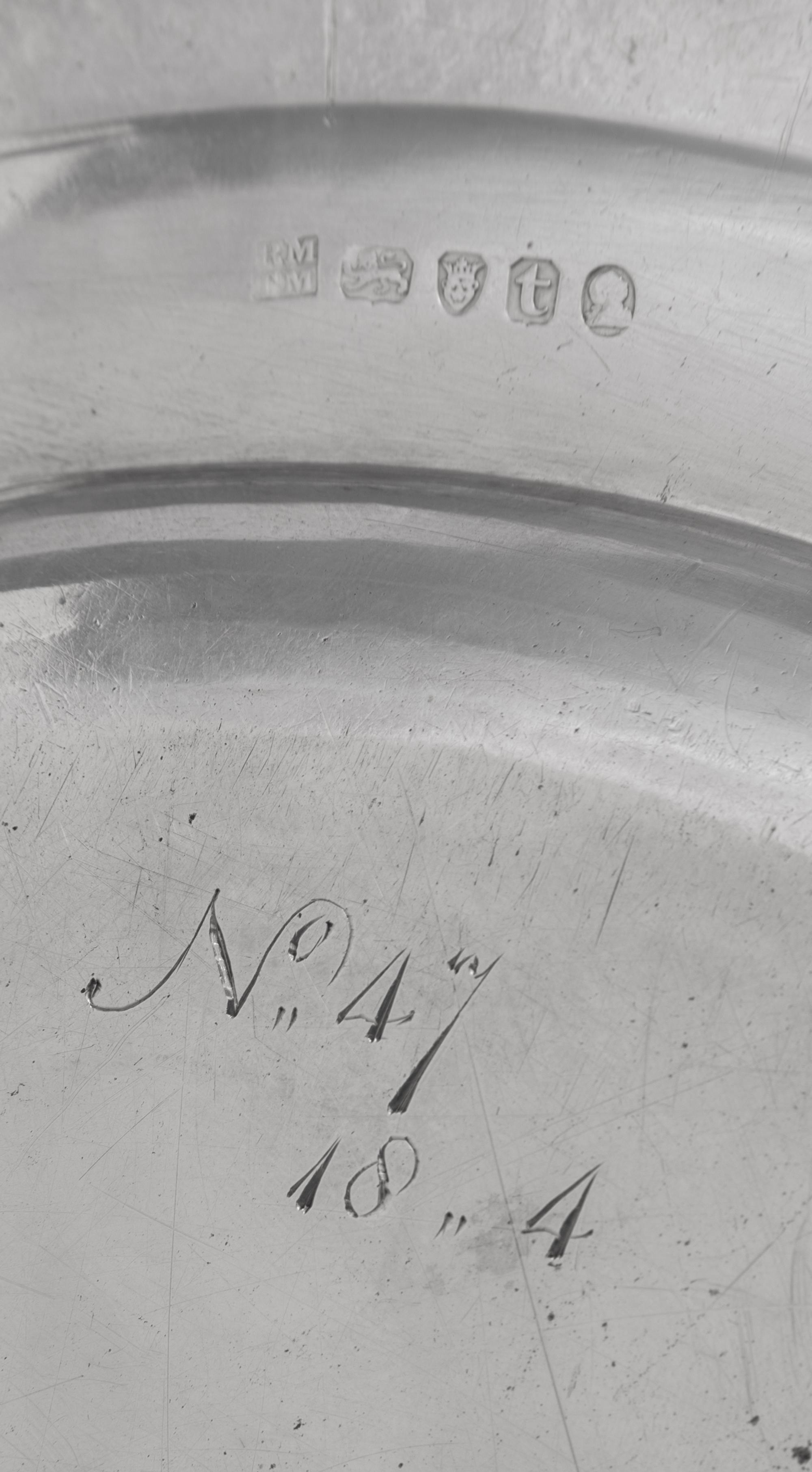 A Set of Eighteen George III Silver Plates