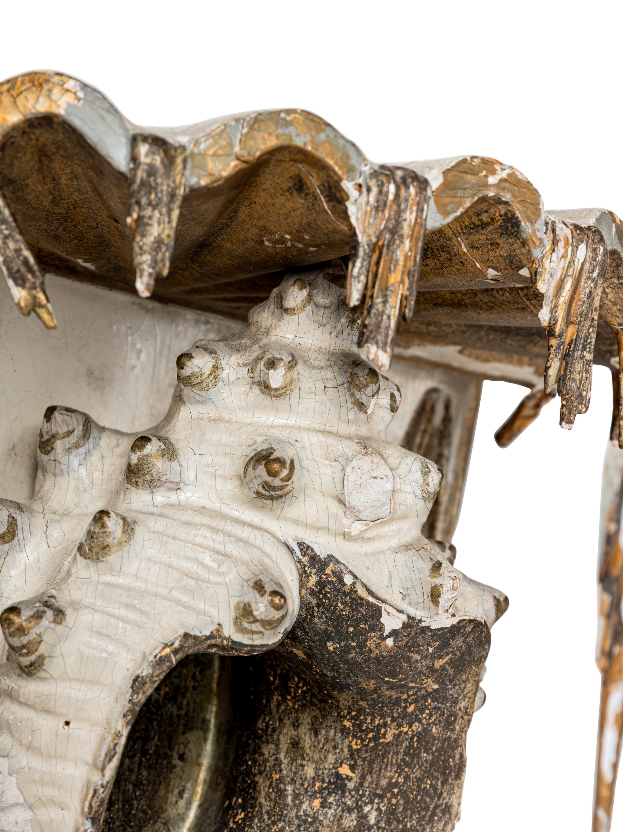 A Pair of North European Gilt and Cream-Painted Grotto Style Wall Brackets