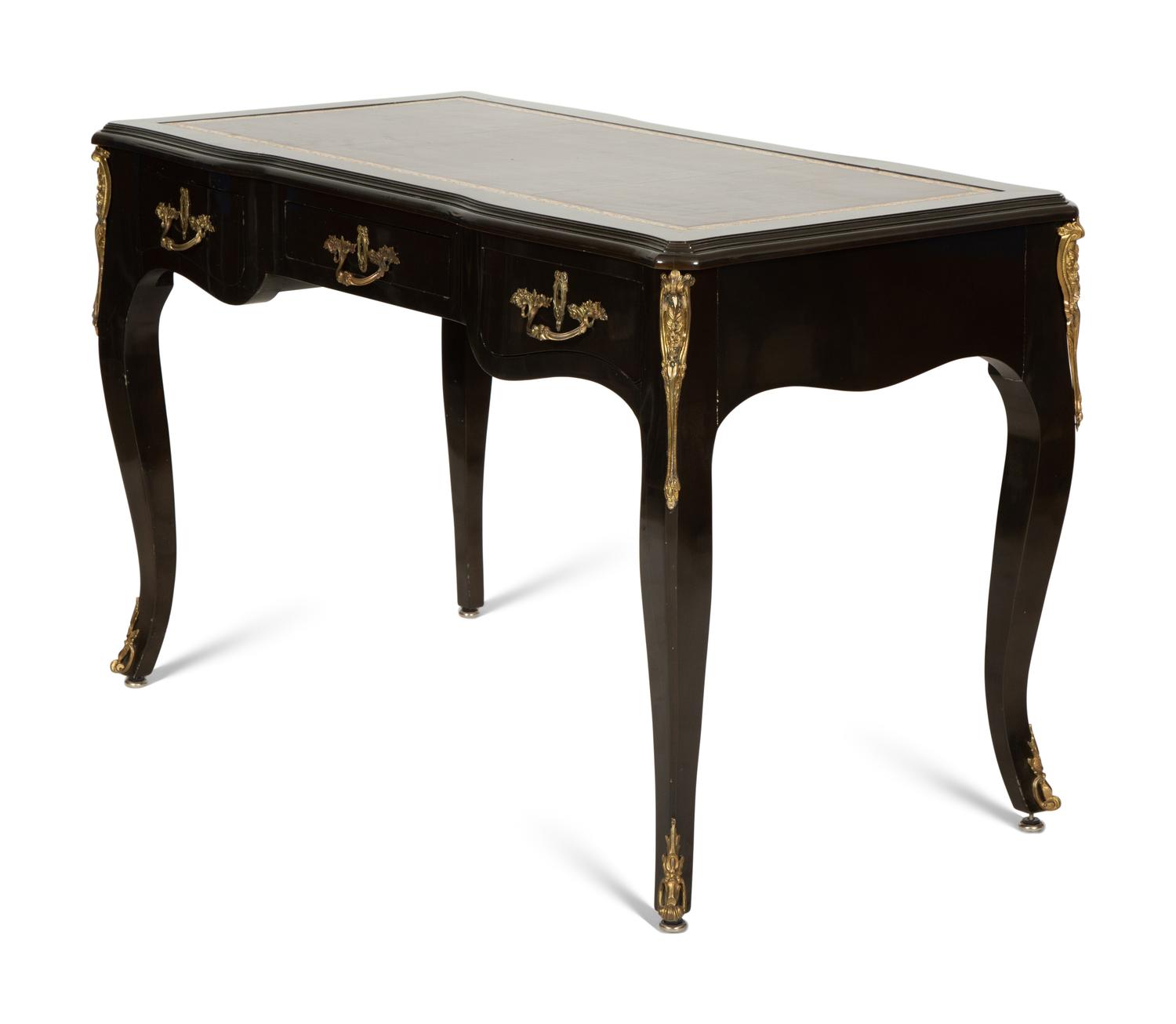A Louis XV Style Gilt Metal-Mounted Ebonized Bureau Plat