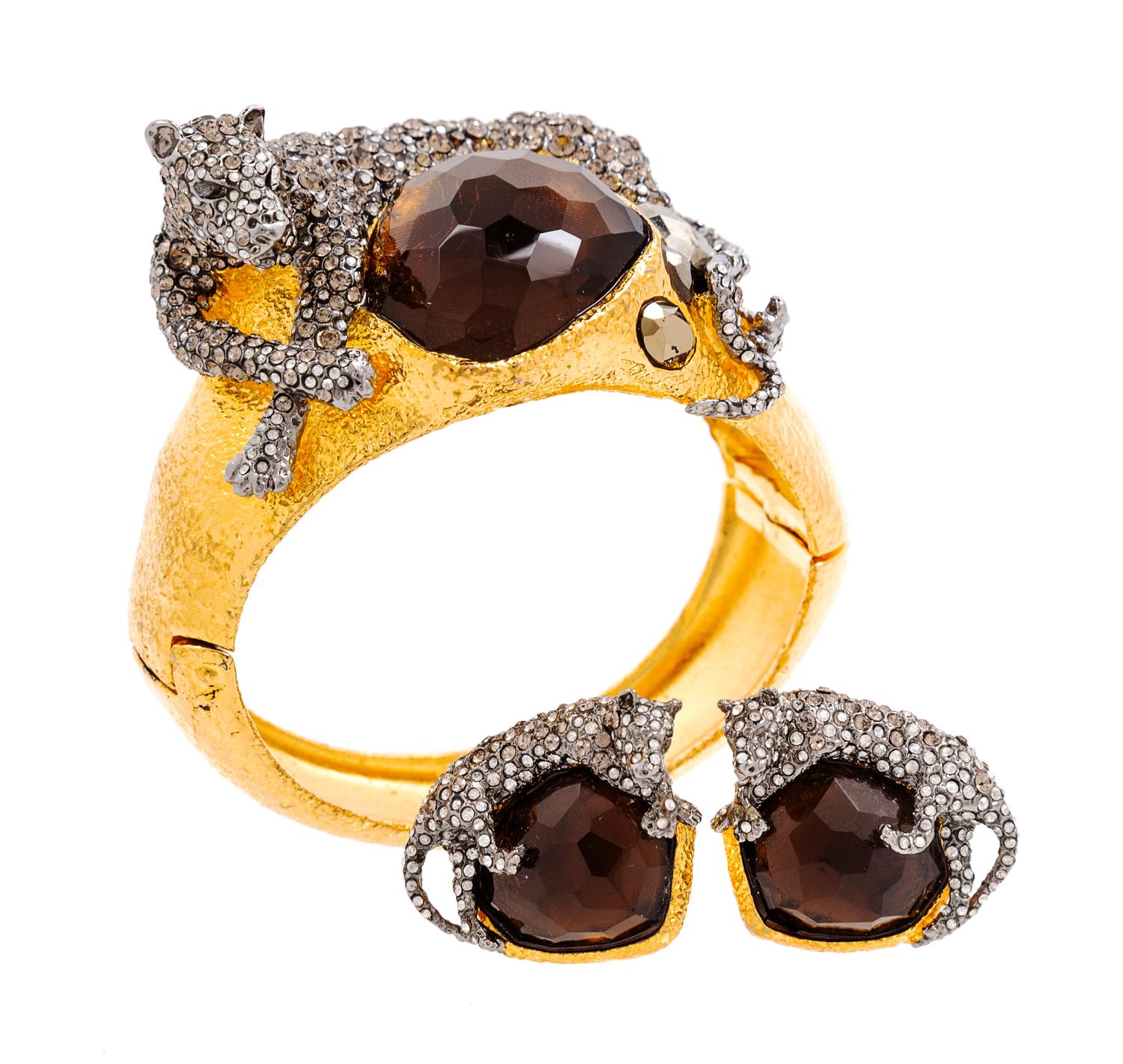 An Alexis Bittar Jaguar Cuff and Matching Earclips, Cuff size: 6.5"; Width: 2"; Earclips: 1" diameter.