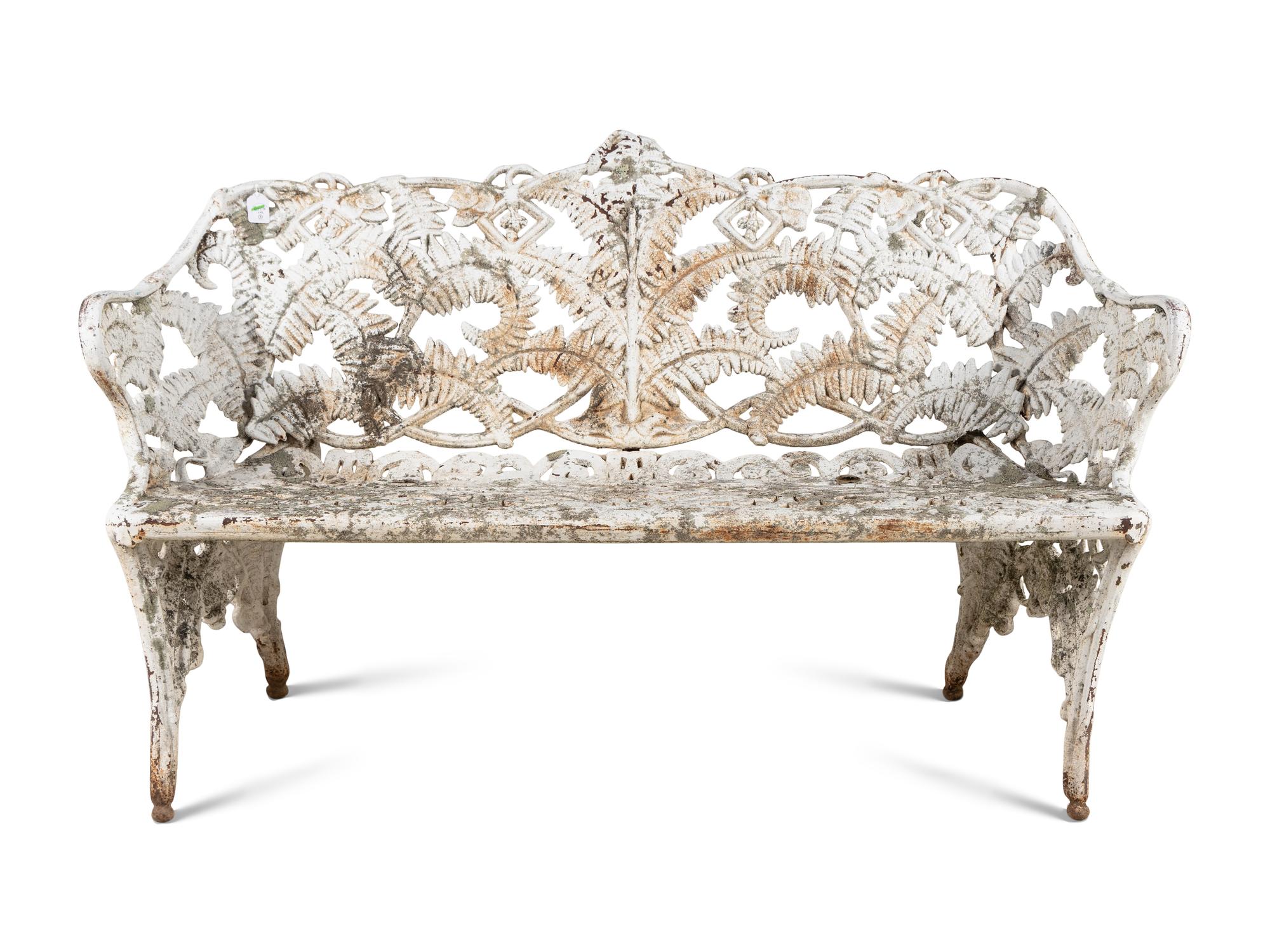 A Victorian Cast Iron Three-Piece Garden Seating Suite