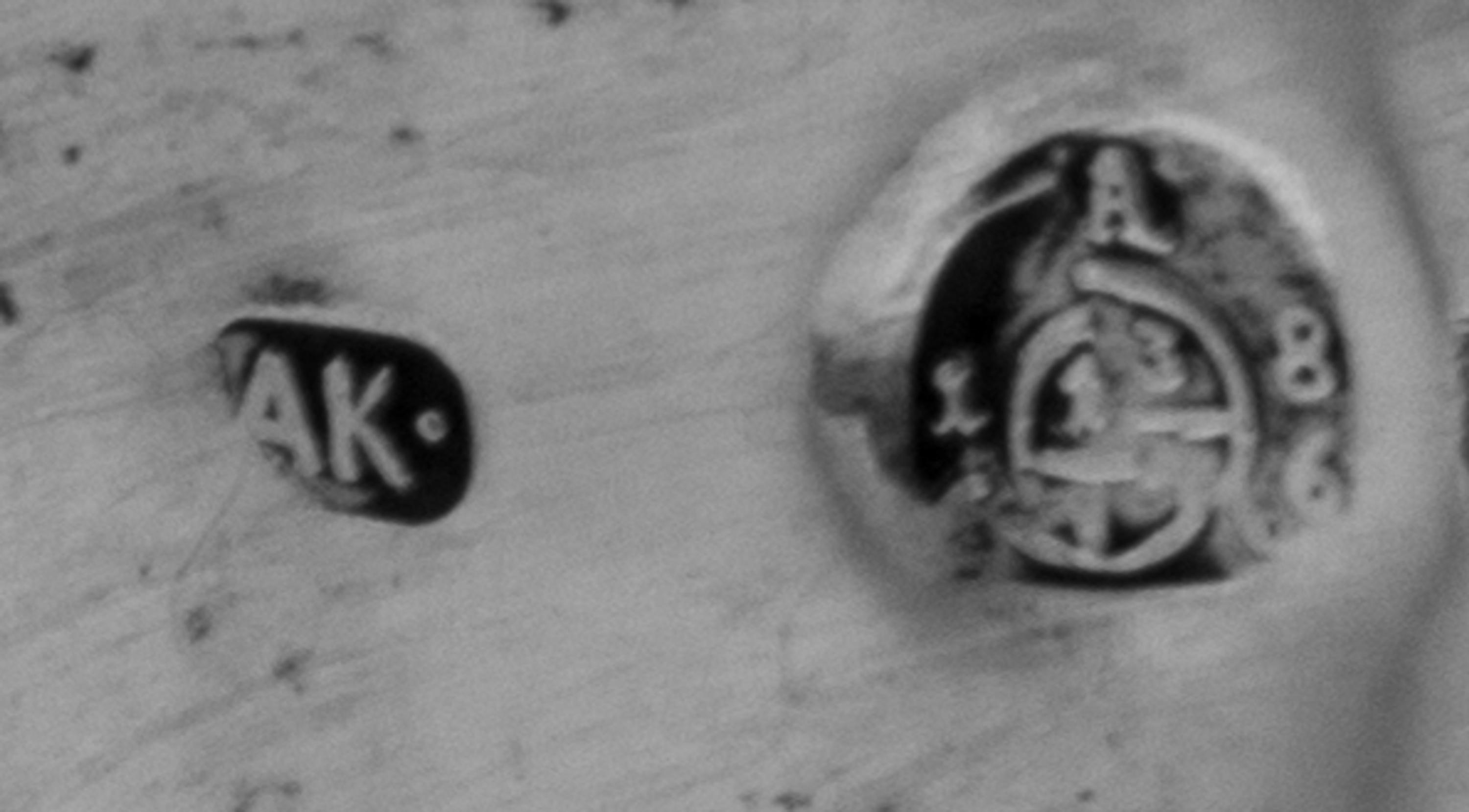 A Set of Four Austrian Silver Wine Goblets, Maker's Mark AK, Vienna, 1865/6, each having grape cluster and vine decorated banding.