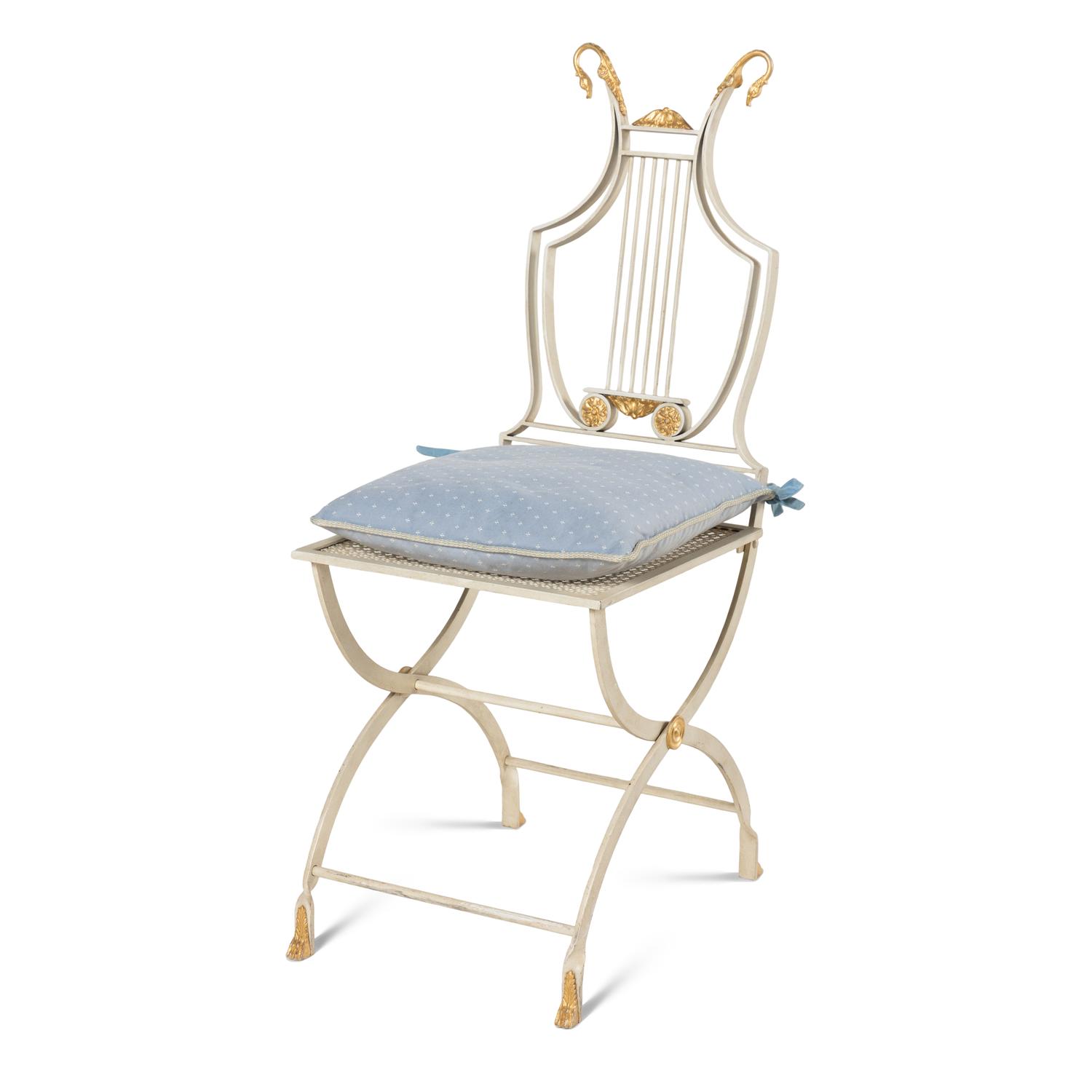 A Set of Six Neoclassical Style Cream-Painted and Parcel Gilt Garden Chairs