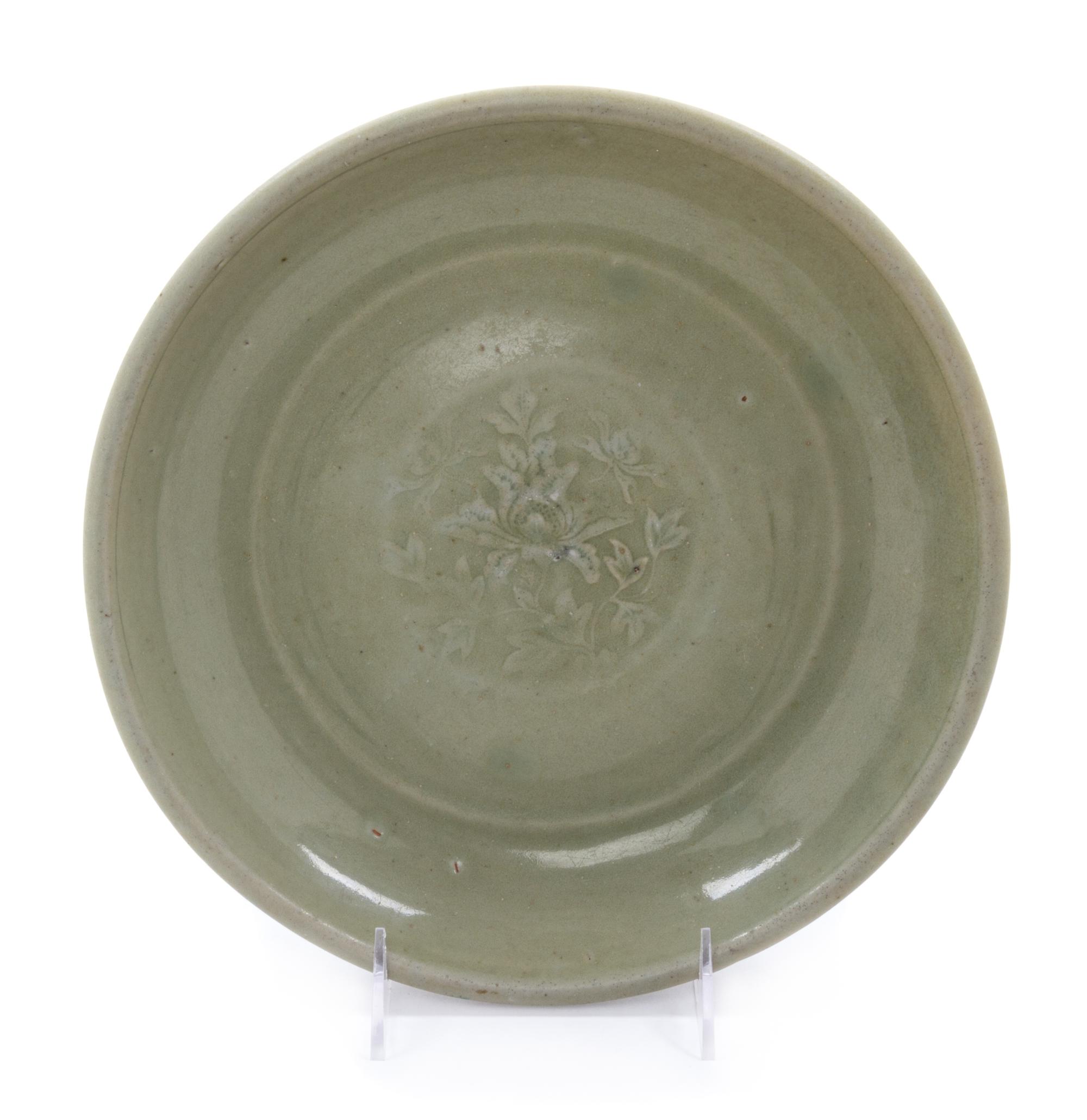 A Chinese Longquan Celadon Glazed Porcelain Plate Diameter 10 1/2 inches. — MING DYNASTY (1368-1644)