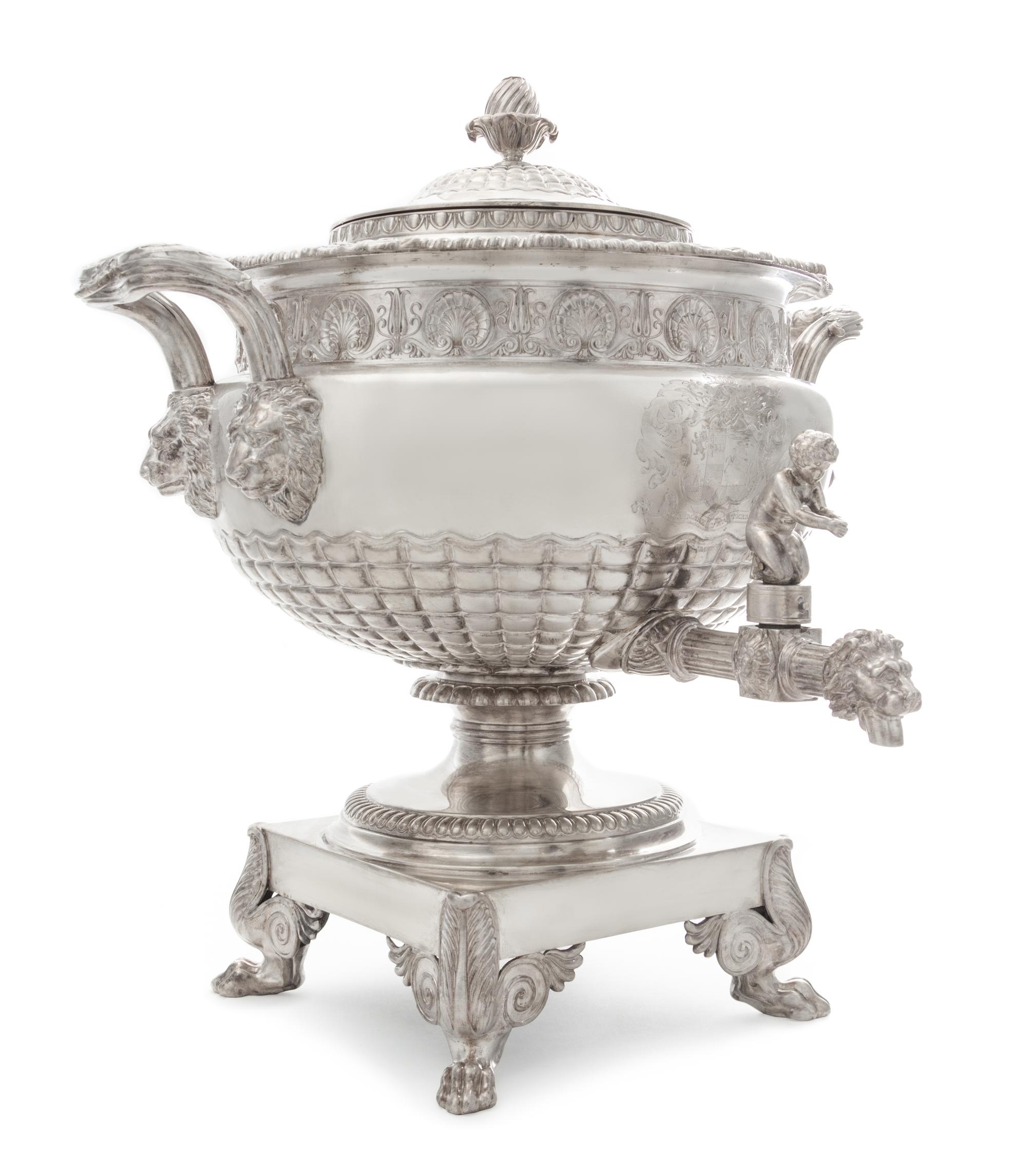 A George III Silver Tea Urn, Paul Storr, London, 1813, the domed lid with a blossom finial, the body with a gadroon and rocaille rim ab