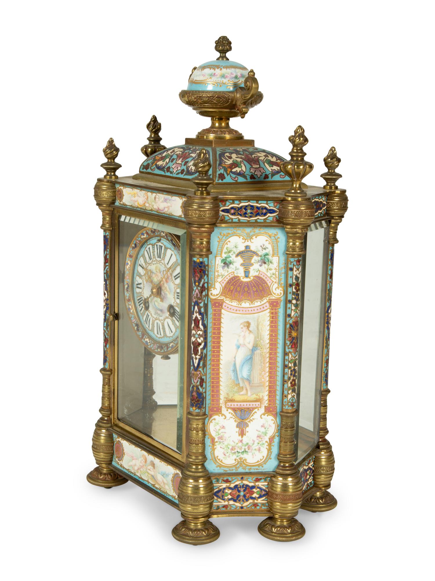 A French Porcelain, Gilt Bronze and Champlevé Clock — CIRCA 1900