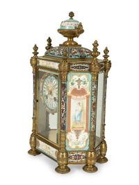 A French Porcelain, Gilt Bronze and Champlevé Clock — CIRCA 1900