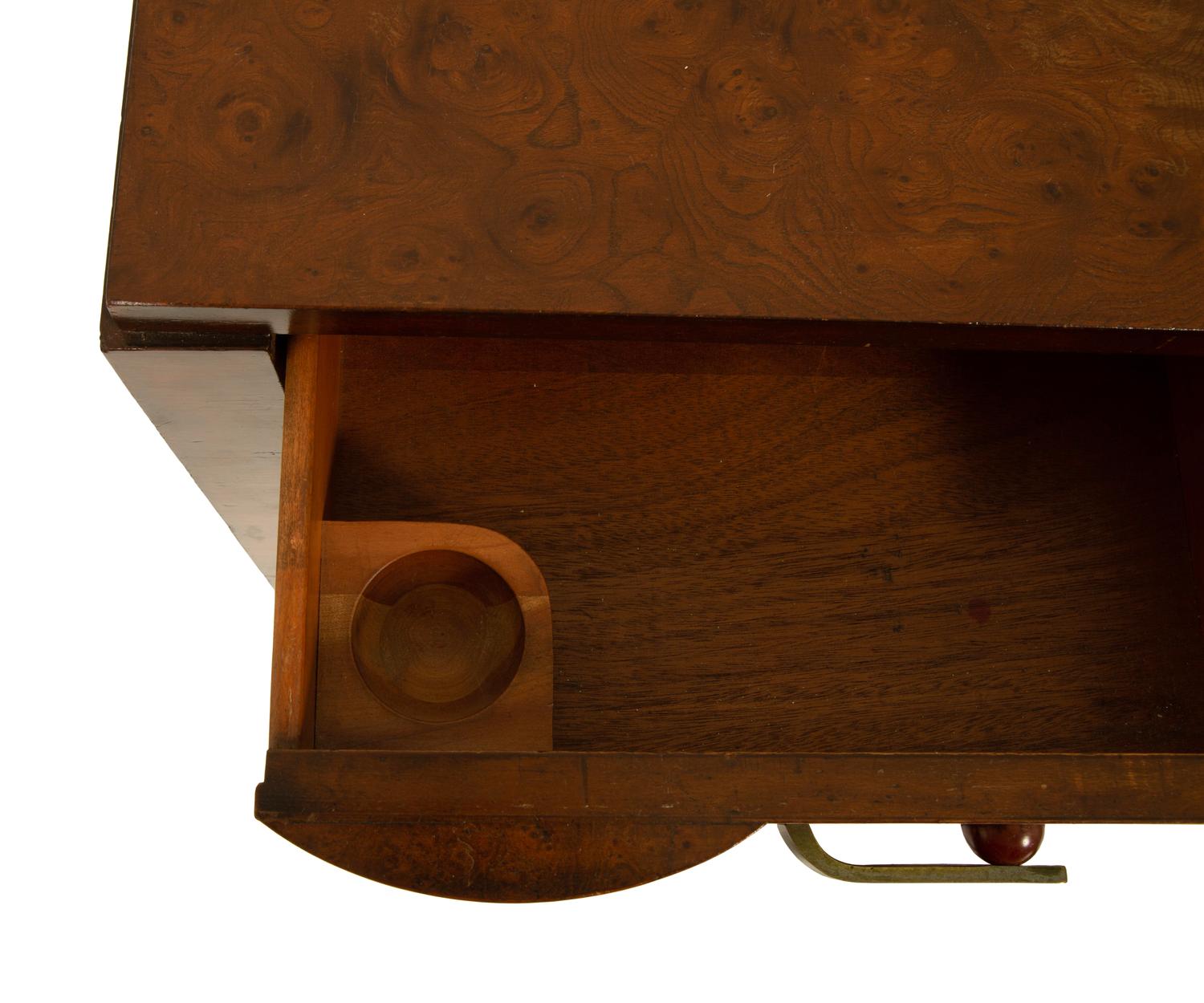 An Art Deco Walnut Chest of Drawers — CIRCA 1930