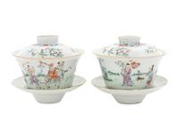 A Pair of Famille Rose Porcelain 'Boys' Covered Bowls and Stands