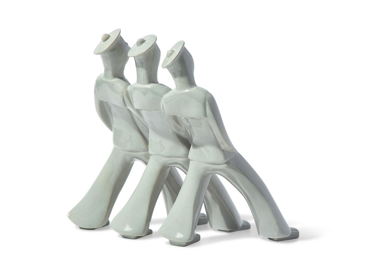 A French Art Deco Earthenware Figure Group of Three Sailors on the March