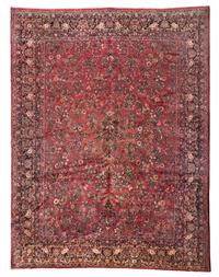 A Sarouk Wool Rug, 13 feet 6 inches x 10 feet 4 inches.