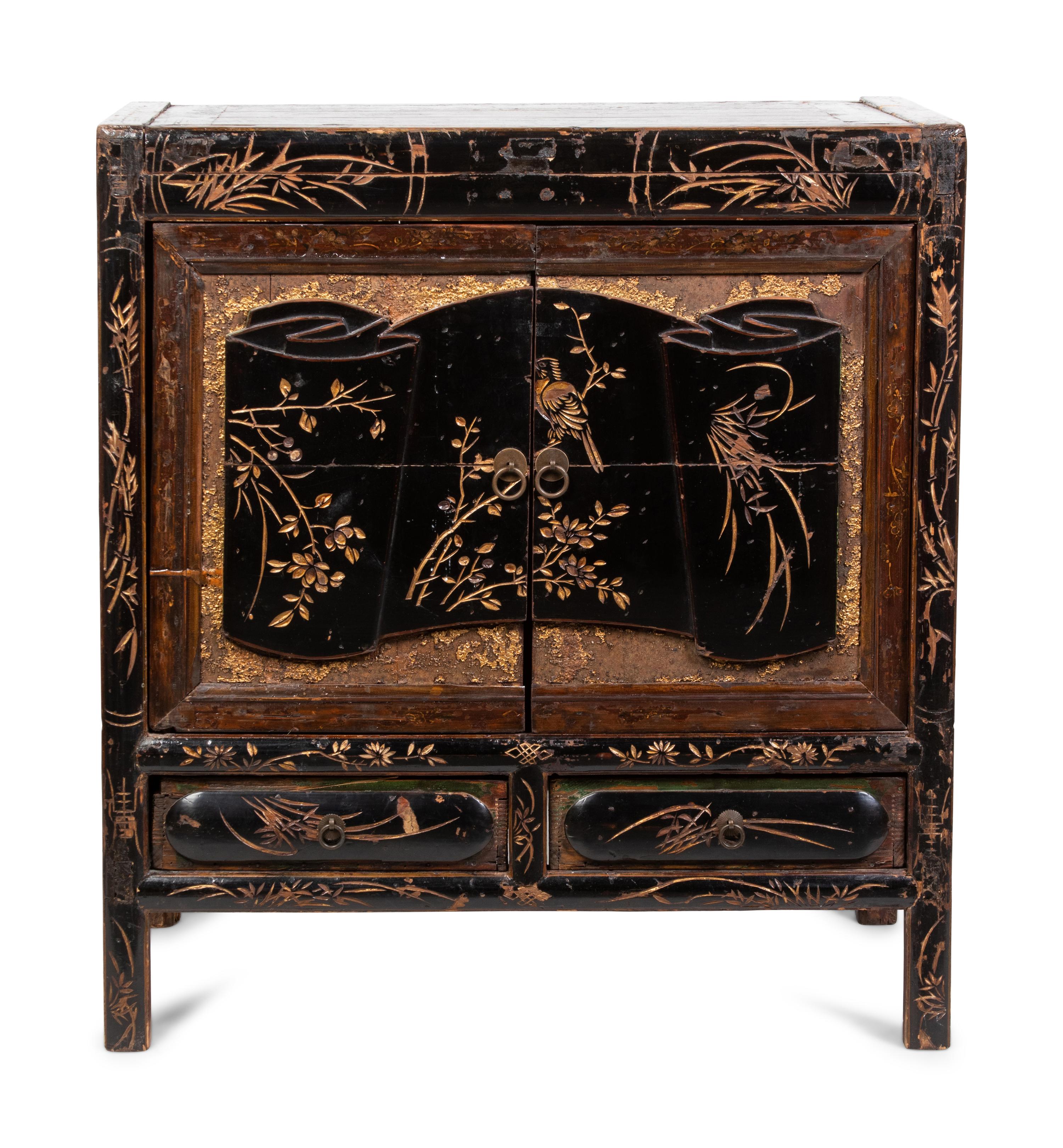 A Chinese Export Cabinet with Carved Lacquer Decoration