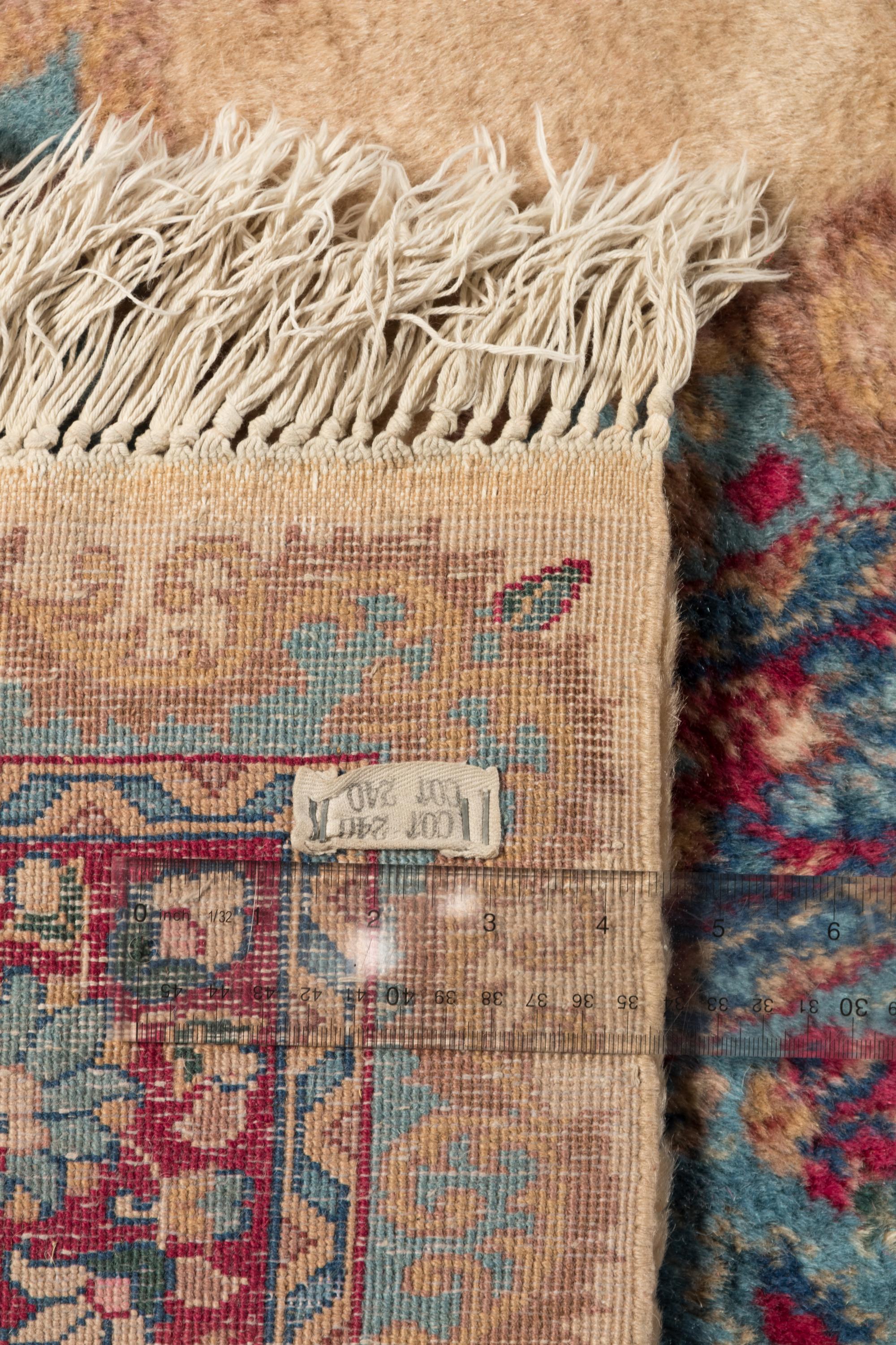 A Kirman Wool Rug