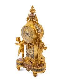 A French Gilt Bronze and Champlevé Clock Garniture Retailed by Tiffany and Co.