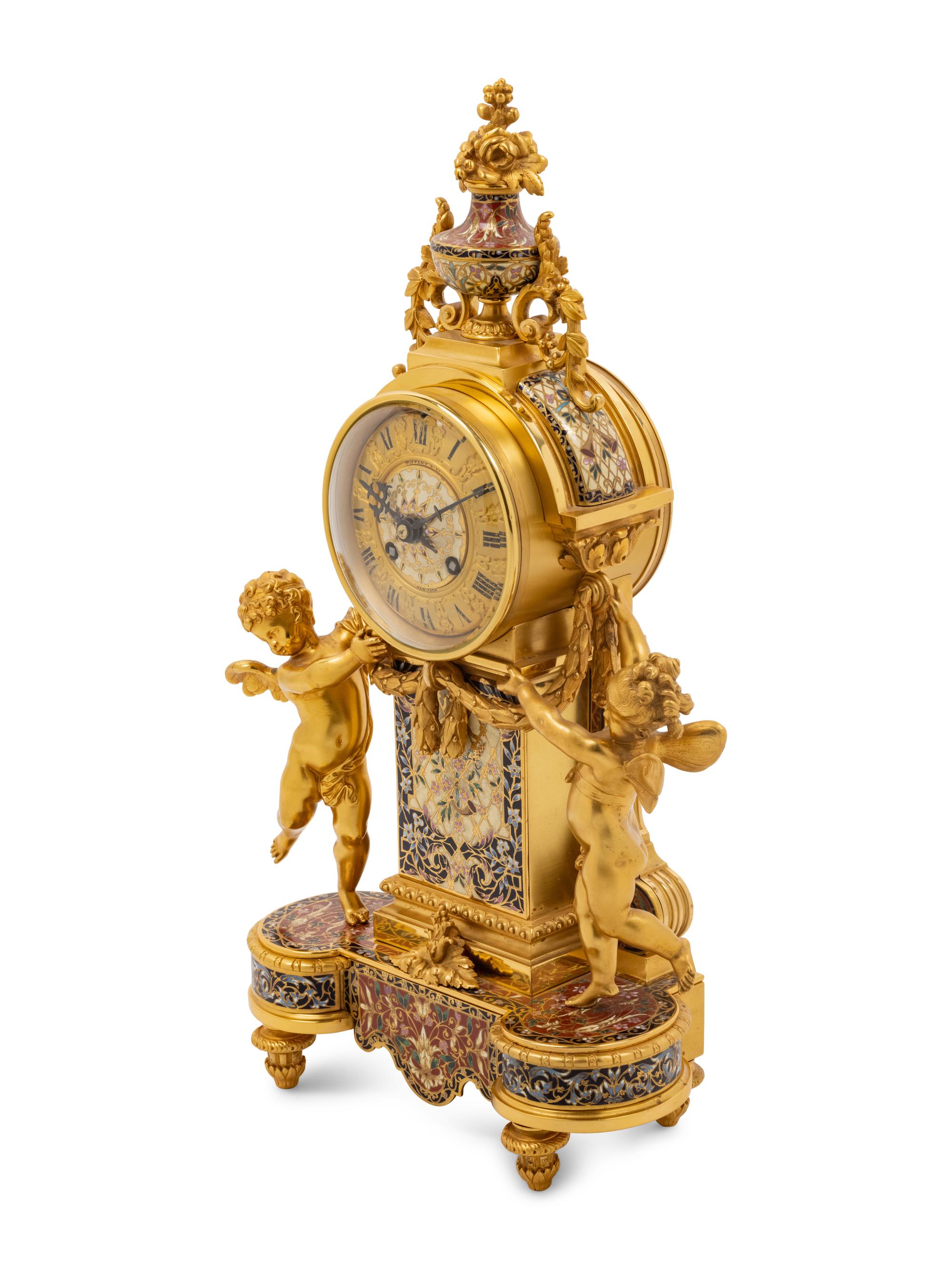 A French Gilt Bronze and Champlevé Clock Garniture Retailed by Tiffany and Co.