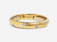 An 18K Yellow Gold and Diamond Band by Tiffany & Co.