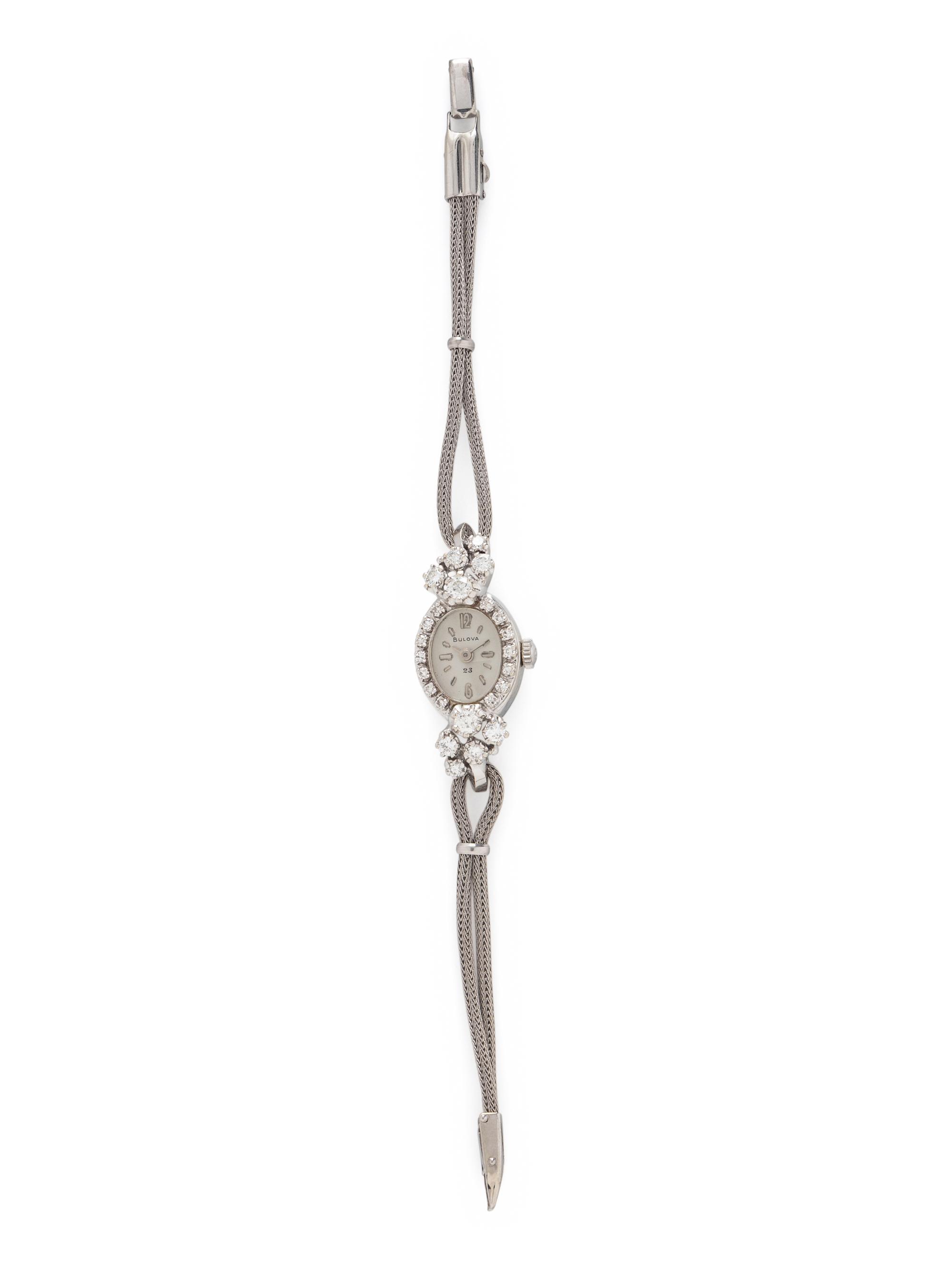BULOVA, 14K WHITE GOLD AND DIAMOND DRESS WATCH