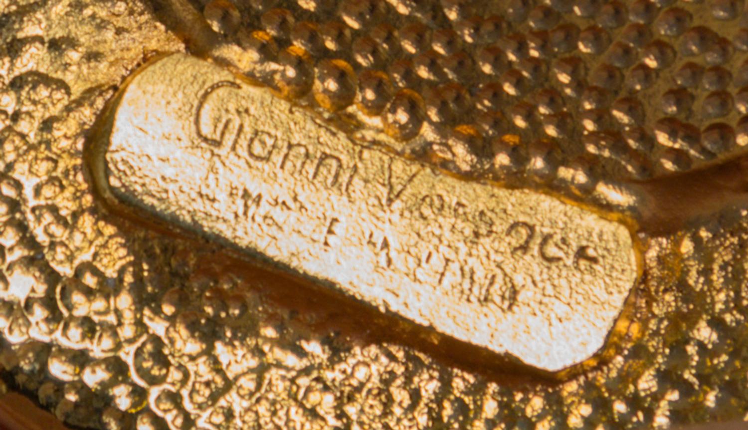 A Gianni Versace Yellow Medallion and Greco Link Belt, 29"- 34" x 1.25"; Medallions: 2.25" x 2.25".