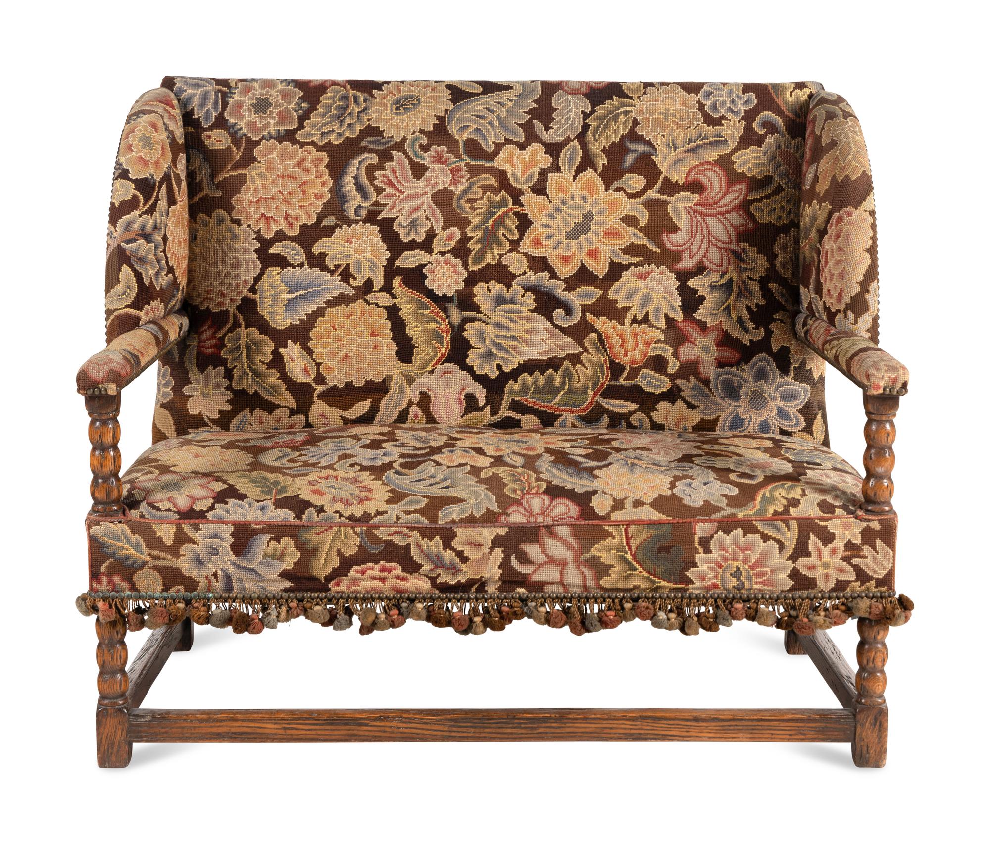 A French Oak and Gros Point Upholstered Wingback Settee