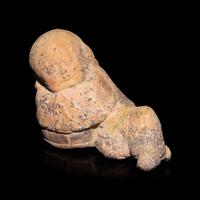 A Chinese Painted Pottery Figure of a Girl, Song Dynasty — 宋 彩繪陶臥女童