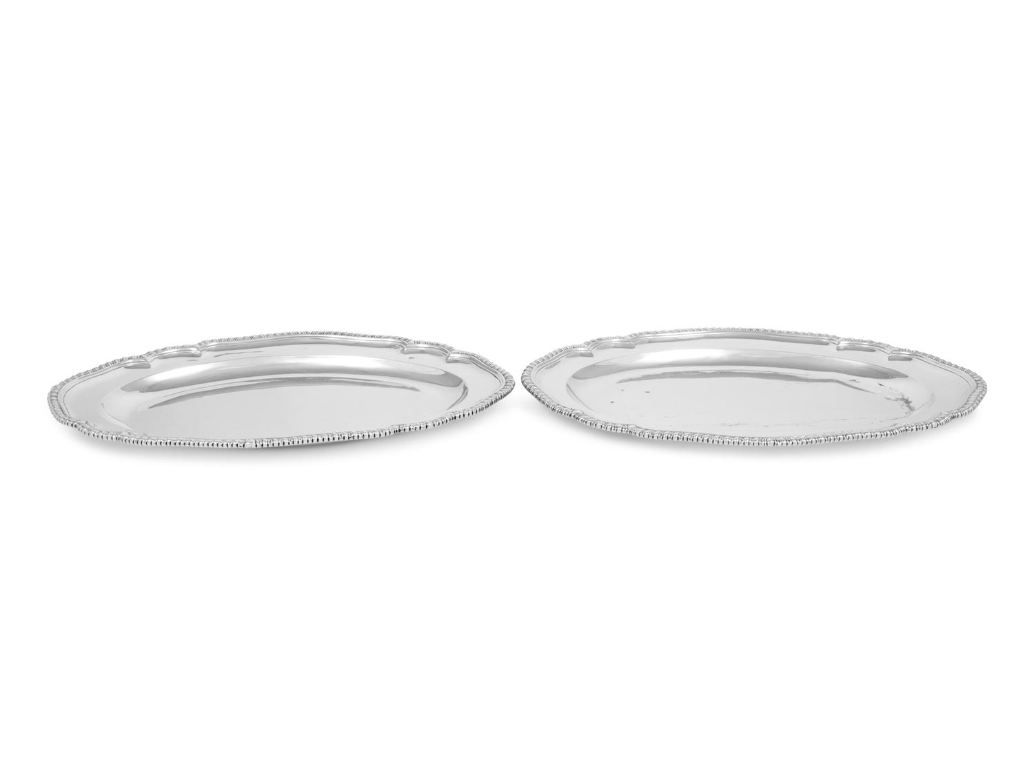 A Pair of George III Silver Meat Platters