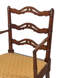 A Set of Four English Mahogany Faux-Bamboo Arm Chairs