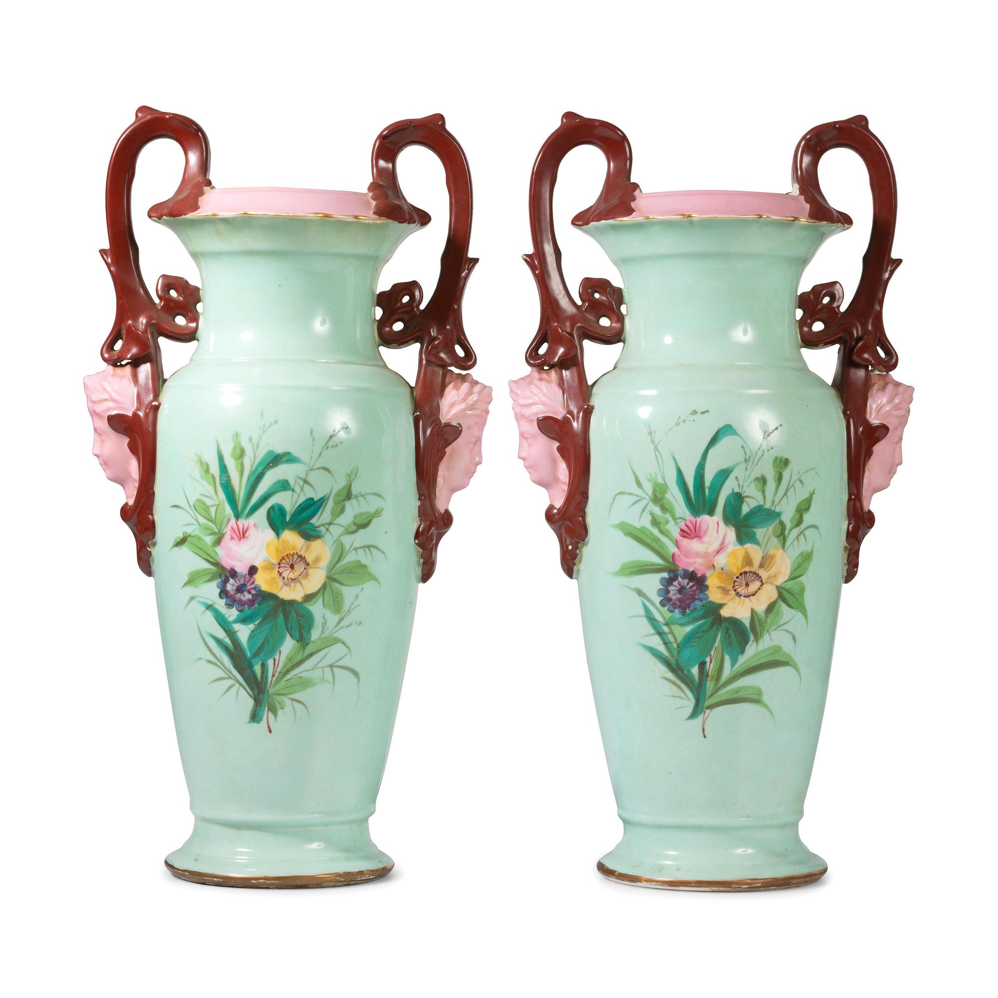 A Pair of Continental Porcelain Urns with Hand Painted and Transfer Decoration