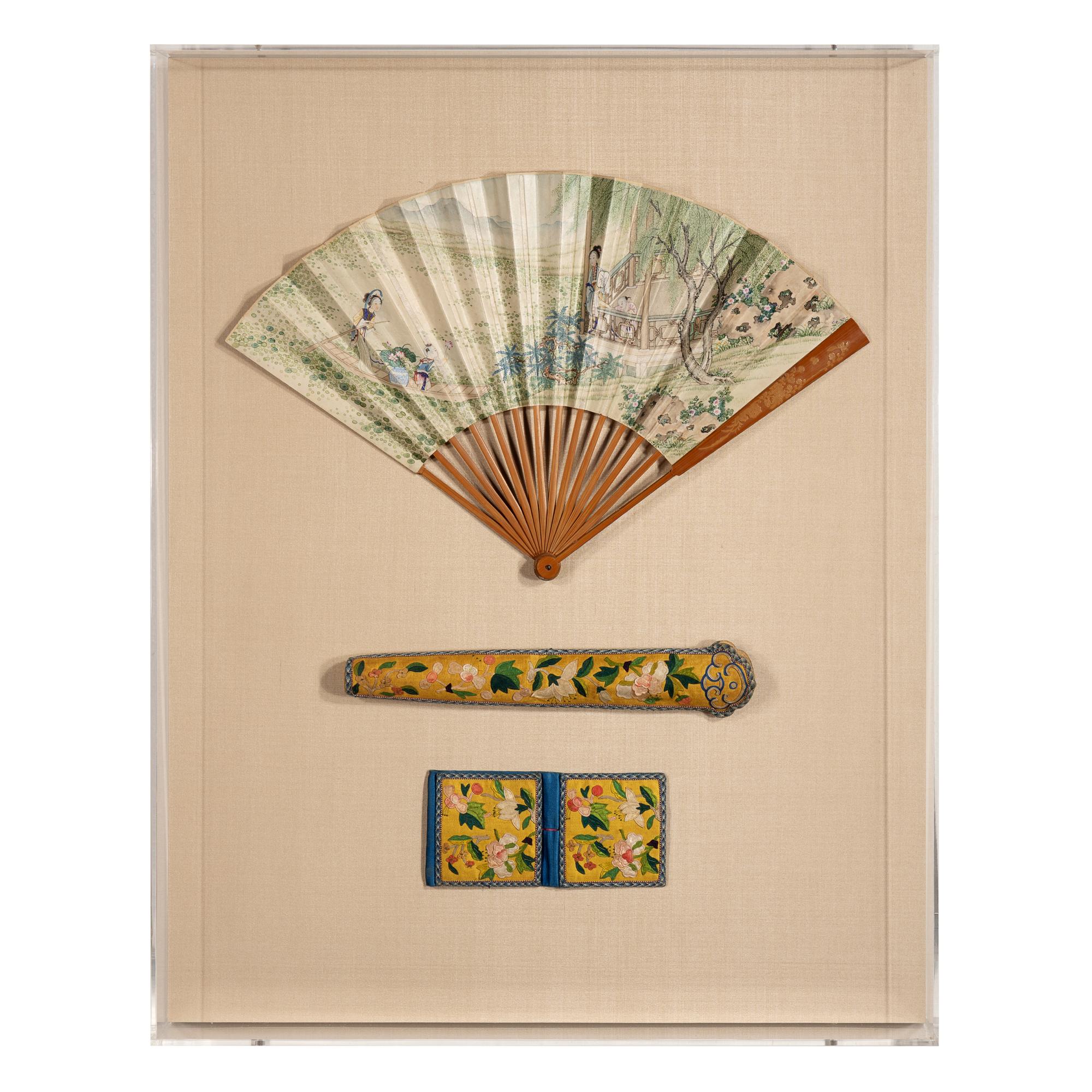 A Chinese Painted Folding Fan and Two Silk-Embroidered Accessories, 19th Century — 清晚期 紙本設色采蓮圖摺扇及黃地綉花扇套、錢包一套
