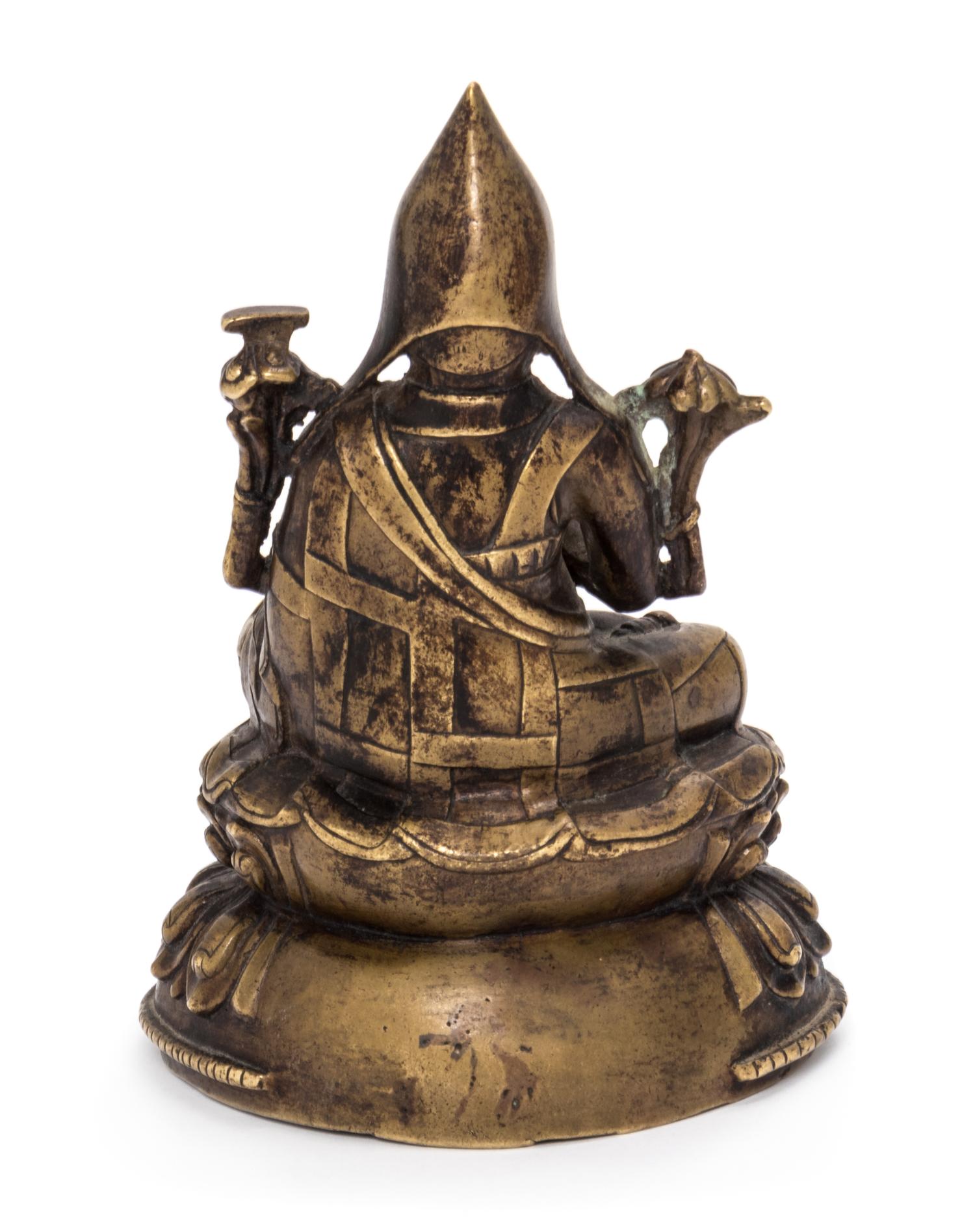A Sino-Tibetan Copper Figure of Lama Height 5 1/2 inches. — 19TH CENTURY