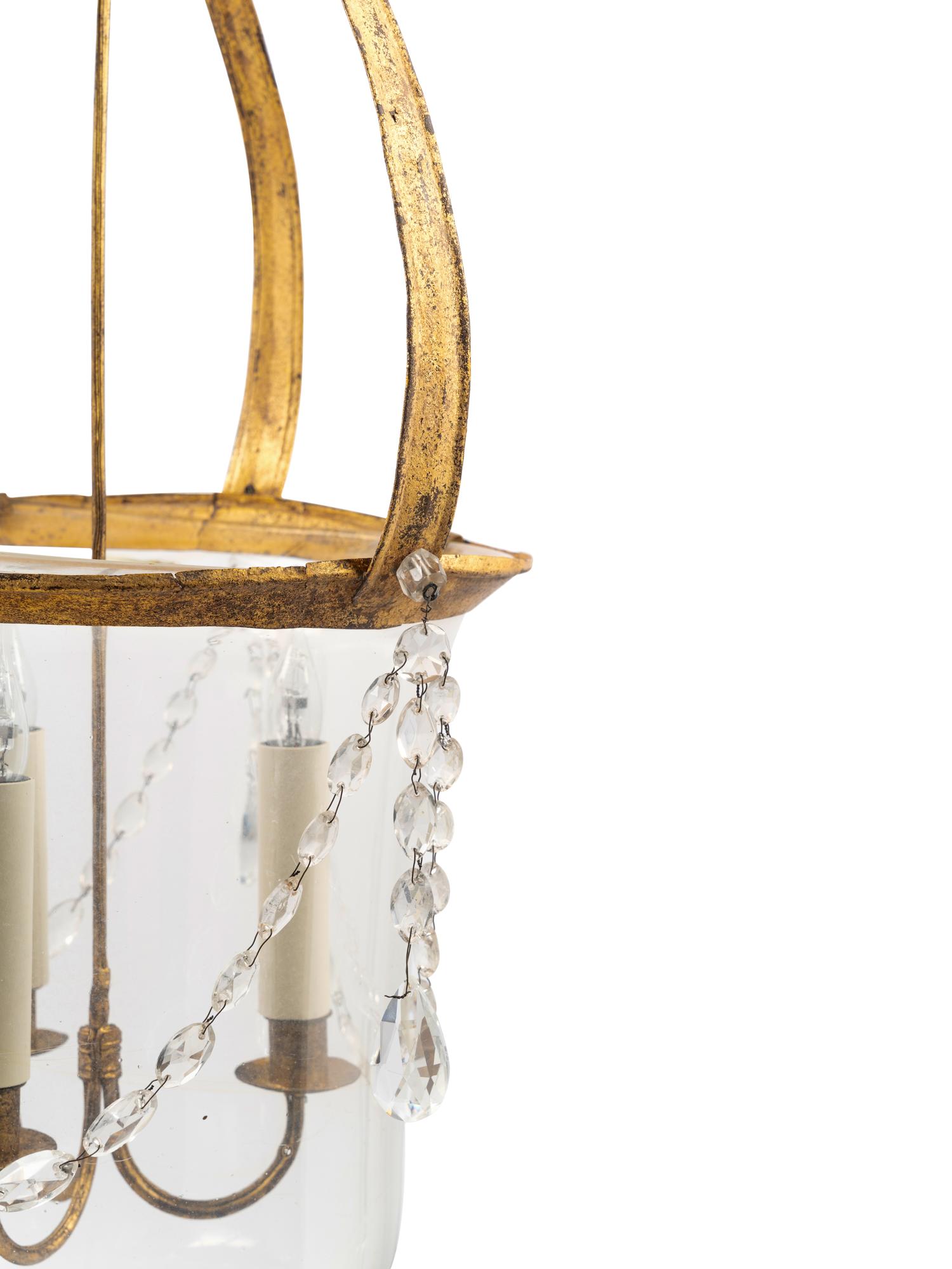 A Regency Style Gilt Metal and Glass Three-Light Lantern