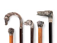 Five Silver and Silvered-Metal Mounted Zoomorphic Canes and Walking Sticks