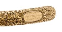An American Presentation 14 Karat Gold Handled Cane, Length of handle 5 x length overall 34 inches.