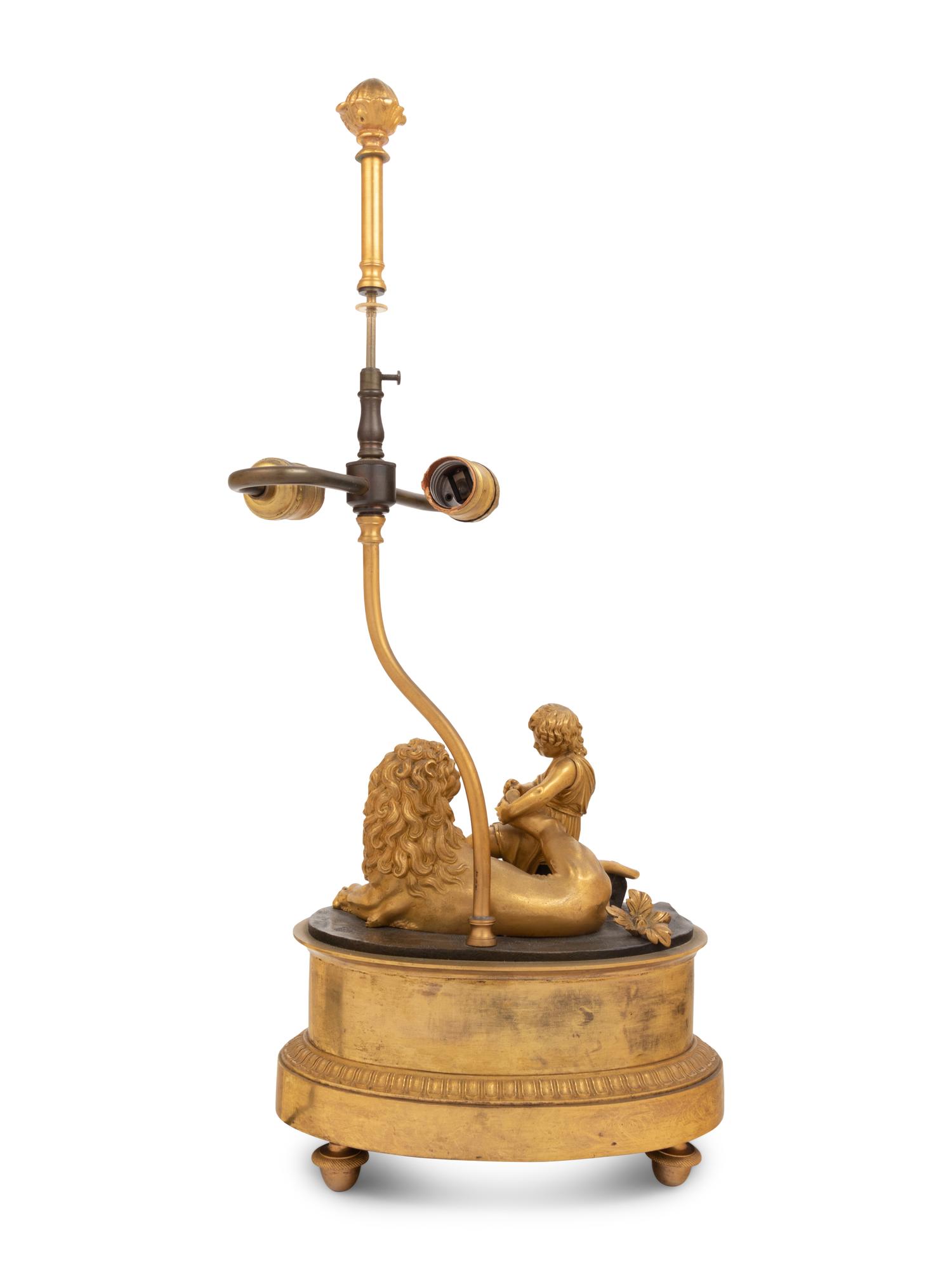A Continental Gilt Bronze Figural Group Mounted as a Lamp