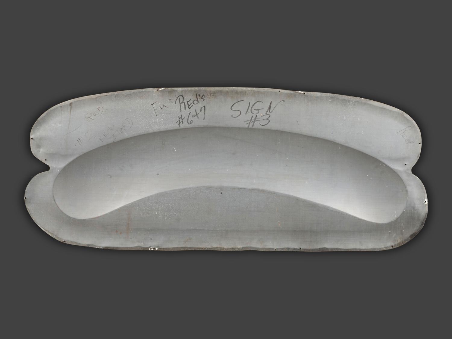 A Coca-Cola Embossed Tin Hot Dog Sign