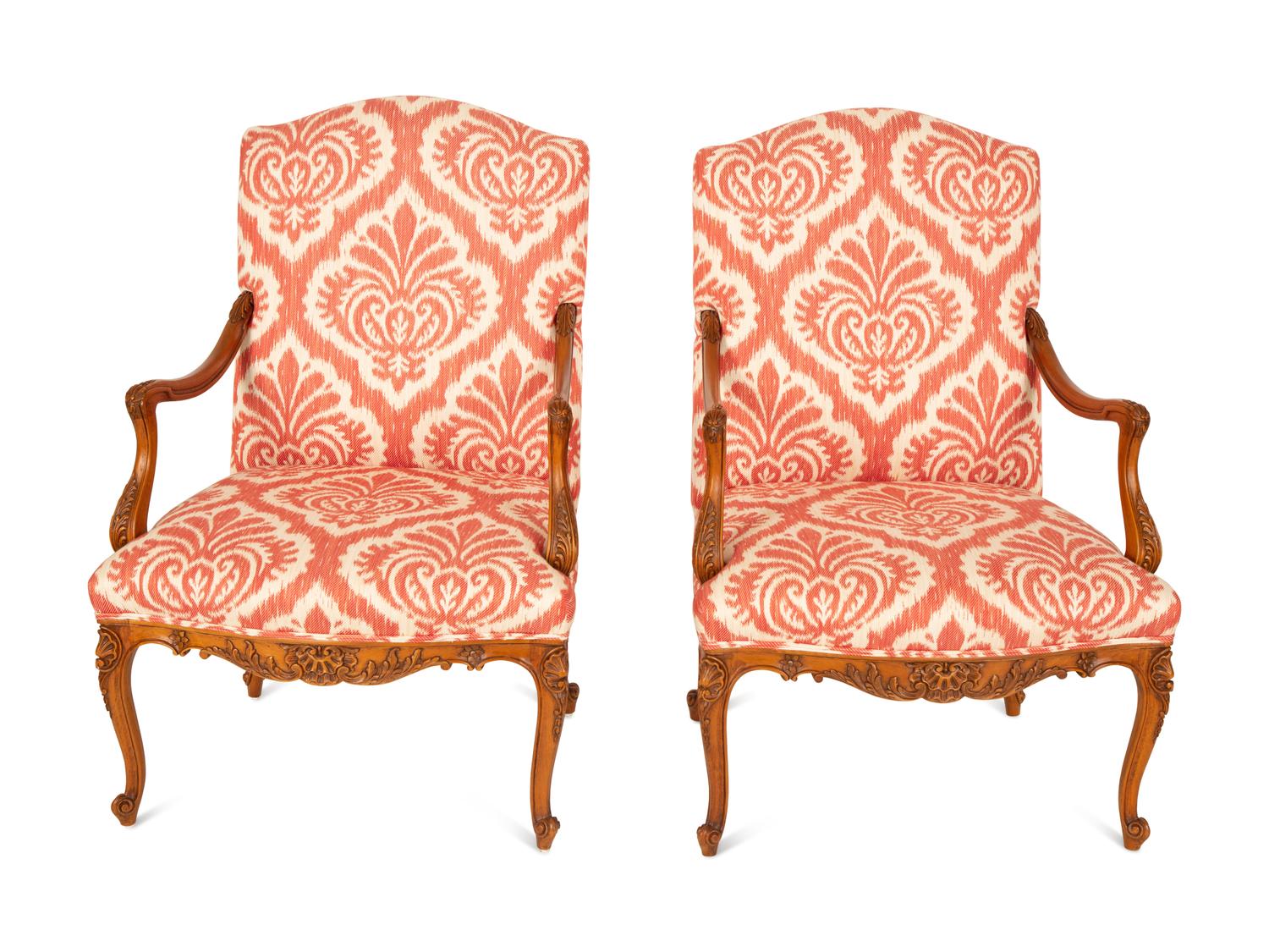 A Pair of Régence Style Walnut Fauteuils