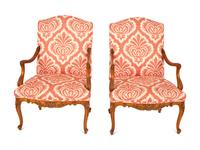 A Pair of Régence Style Walnut Fauteuils