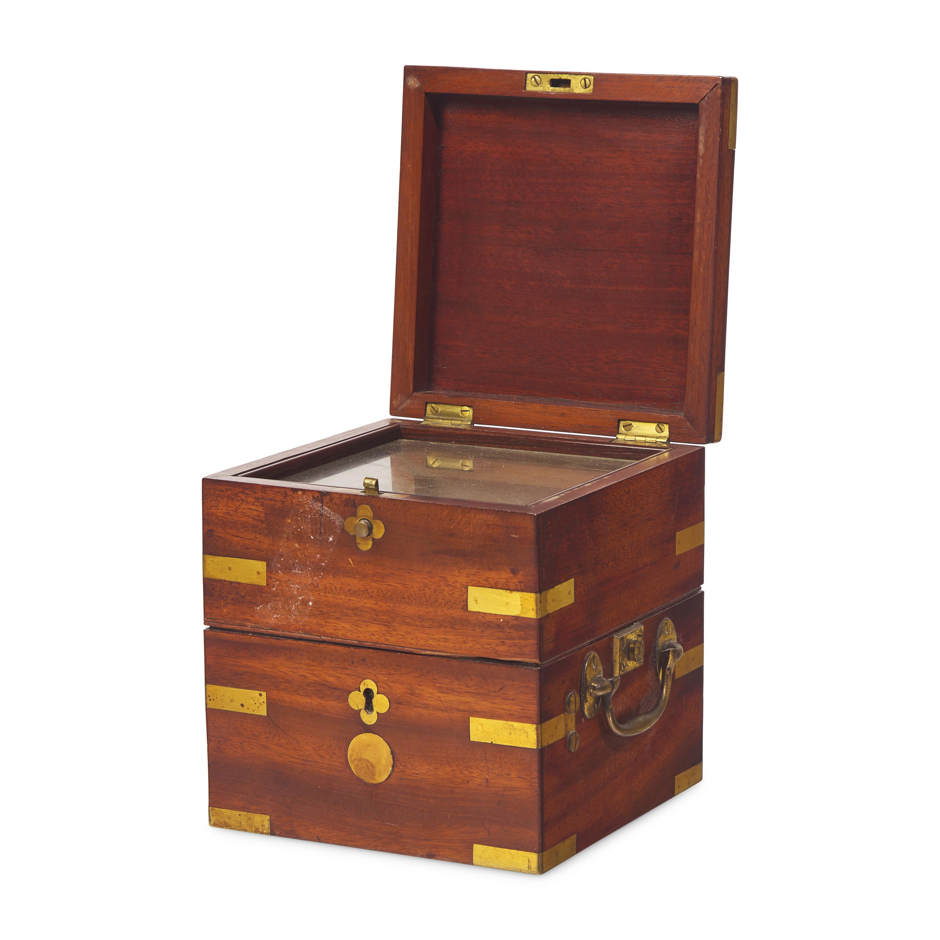 A Brass and Mahogany Marine Chronometer