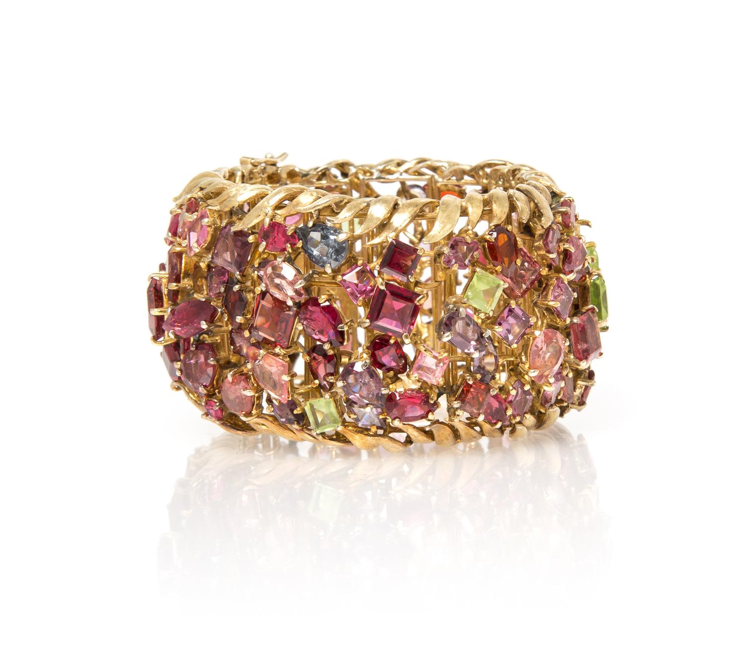 An 18 Karat Yellow Gold and Multi Gem Bracelet, 67.90 dwts.