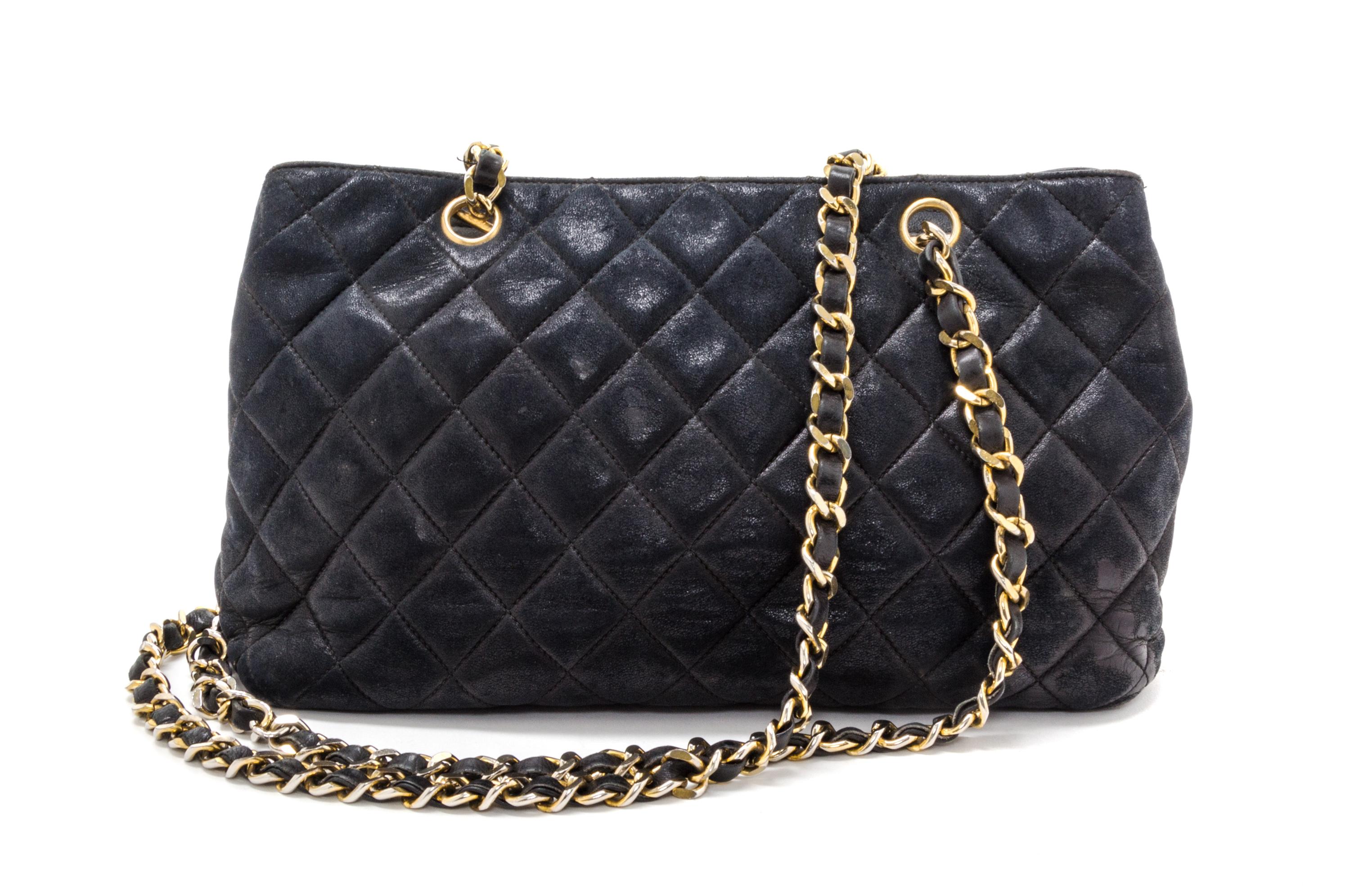 A Chanel Black Distressed Leather Quilted Handbag, 12" x 8" x 4".