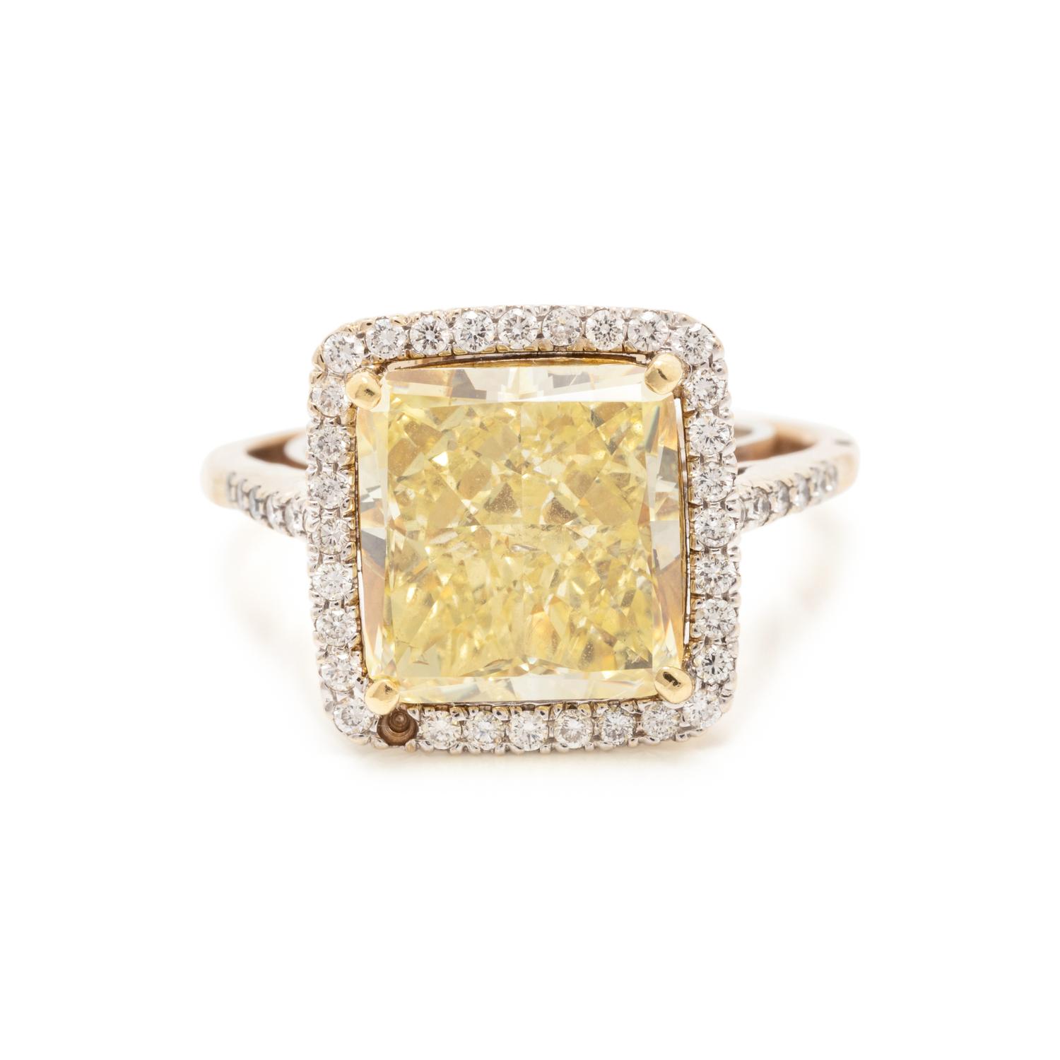 FANCY INTENSE YELLOW DIAMOND AND DIAMOND RING