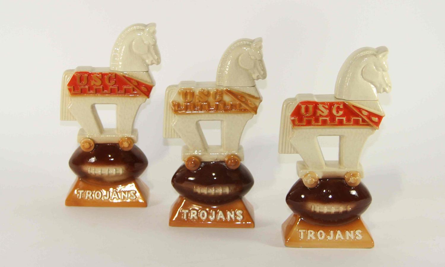 Three Figural Liquor Bottles Height of tallest 11 1/2 inches.