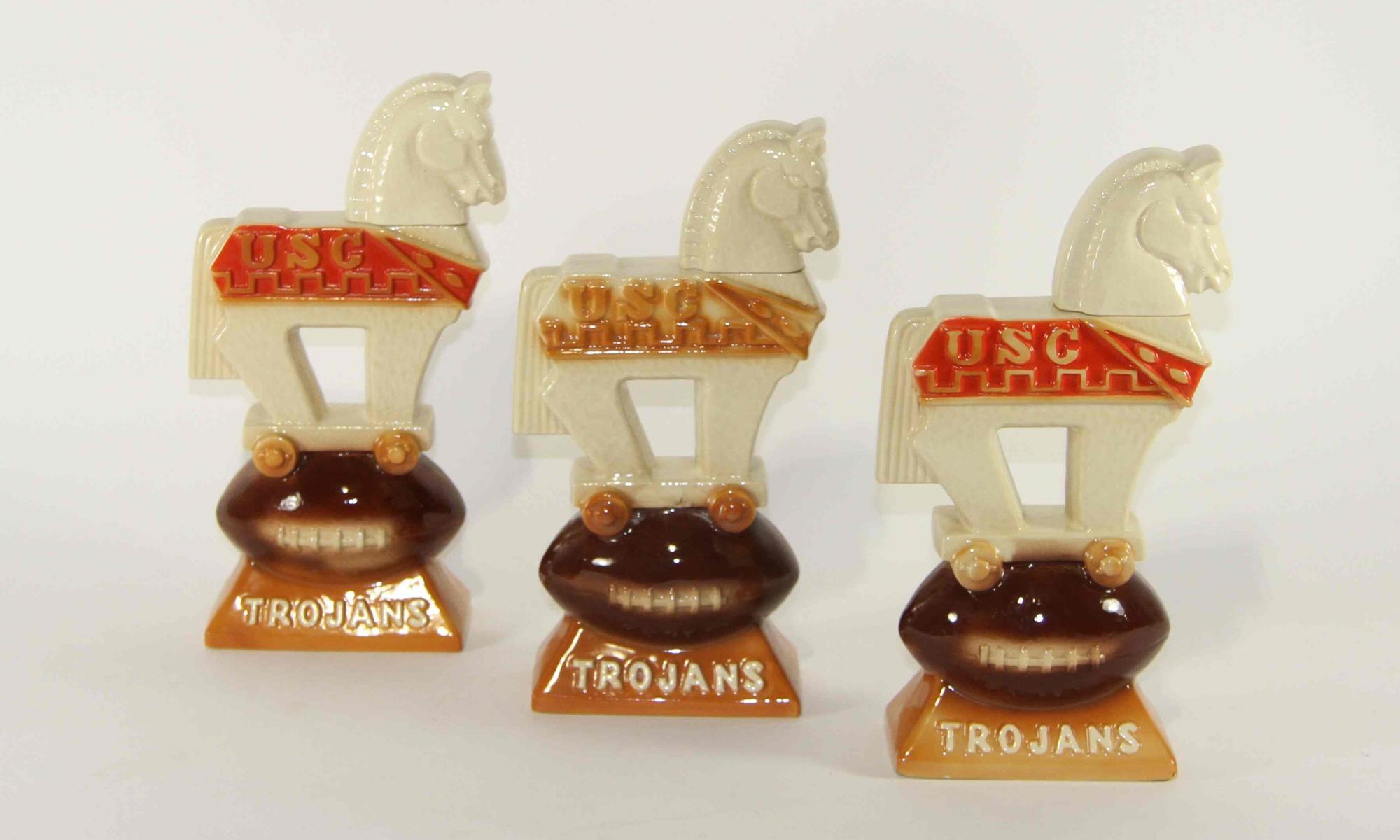 Three Figural Liquor Bottles Height of tallest 11 1/2 inches.