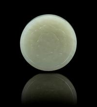 A Chinese White Jade Court Button 18TH CENTURY Diameter 2 3/8 inches. — 18TH CENTURY